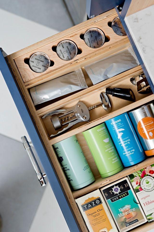Organized drawer with tea and kitchen utensils